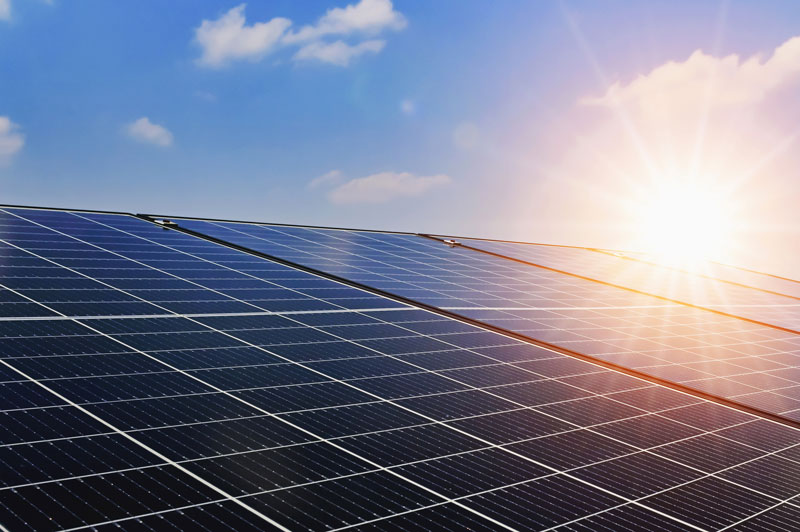 Sunrise over solar panel
