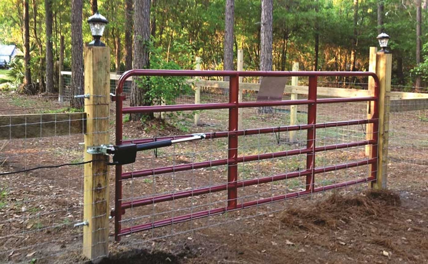 Closed metal farm gate with Ranger 500 gate opener