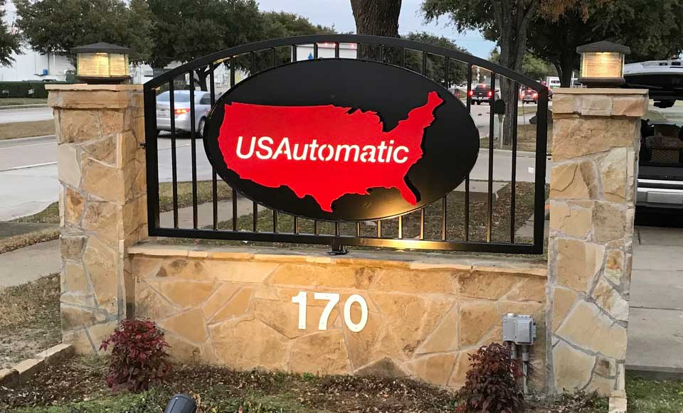 Sign in front of USAutomatic's Lewisville, TX facility
